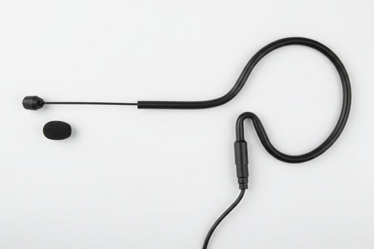 An omni earset microphone with a boom arm, microphone tip, and foam windscreen.