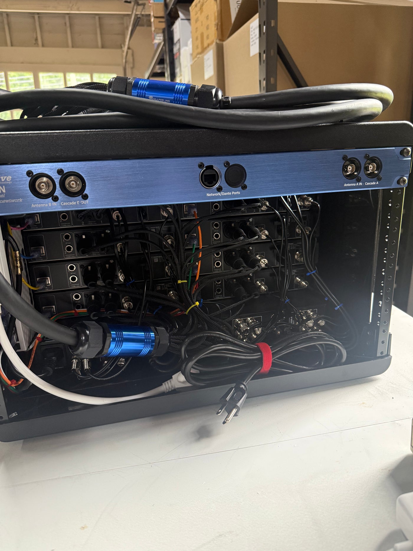 Back of a wireless rack, wired and labeled before it ships