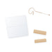 Adhesive remover wipe with mic tape strips and a beige earset microphone (mic and tape not included)